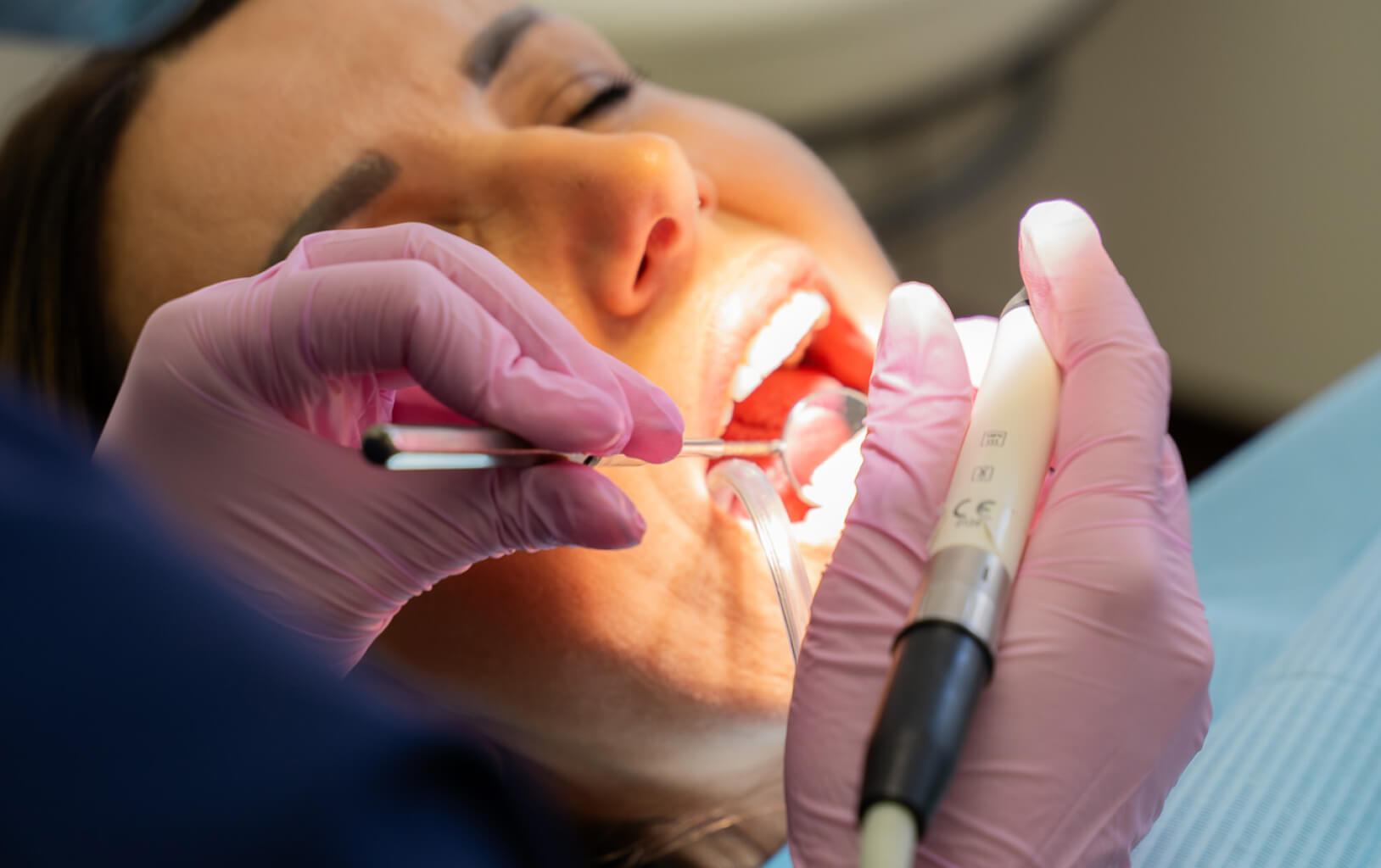 Dentist working in the modern Smilezone dental practice in Zug, Switzerland.