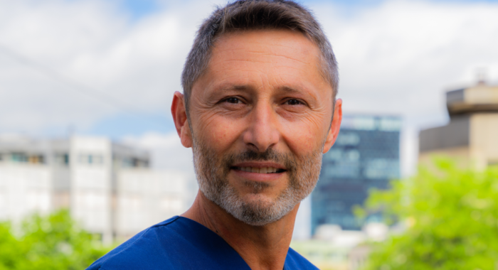 Portrait of friendly oral surgeon Dr. Lothar Gold from Smilezone Practice Zug.
